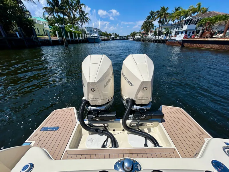 Slide: The Image of 2026 Chris-Craft Catalina 28 with Mercury engines on a waterway. - 13