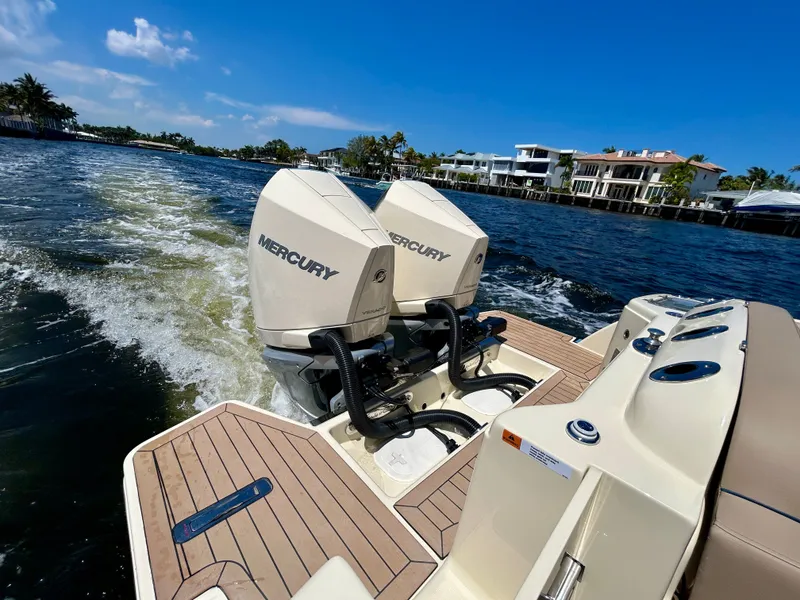 Slide: The Image of Chris-Craft Catalina 28, 2026, with Mercury engines on the water. - 14