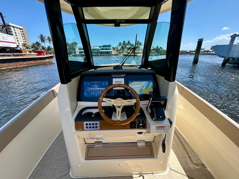 Slide: The Image of Interior view of 2026 Chris-Craft Catalina 28 cockpit on the water. - 3