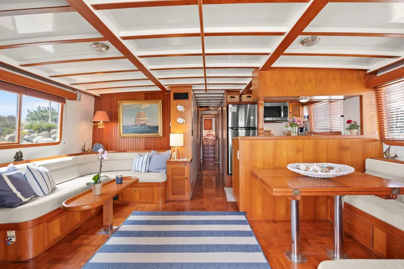 Slide: The Image of Luxurious interior of 1996 Kadey-Krogen 48 Whaleback yacht with wood finishes and modern amenities. - 12