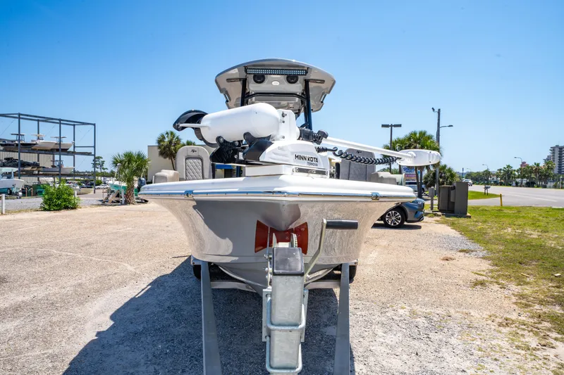 Slide: The Image of 2023 Sea Pro 248 Bay boat on trailer, equipped with Minn Kota trolling motor. - 15