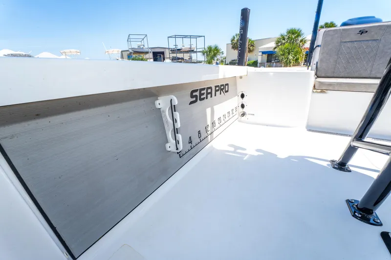 Slide: The Image of 2023 Sea Pro 248 Bay boat interior with measurement markings and seating. - 38