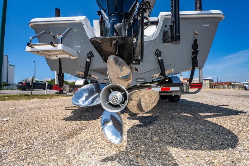 Slide: The Image of 2023 Sea Pro 248 Bay boat propeller and stern view on a trailer. - 44