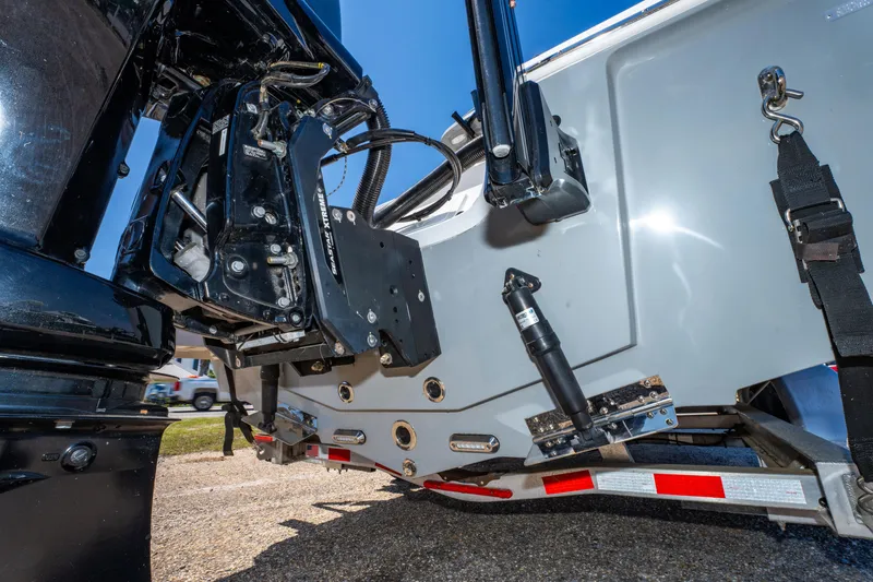 Slide: The Image of 2023 Sea Pro 248 Bay boat engine and transom detail on trailer. - 45