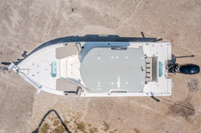 Slide: The Image of Overhead view of 2023 Sea Pro 248 Bay boat on concrete surface. - 5