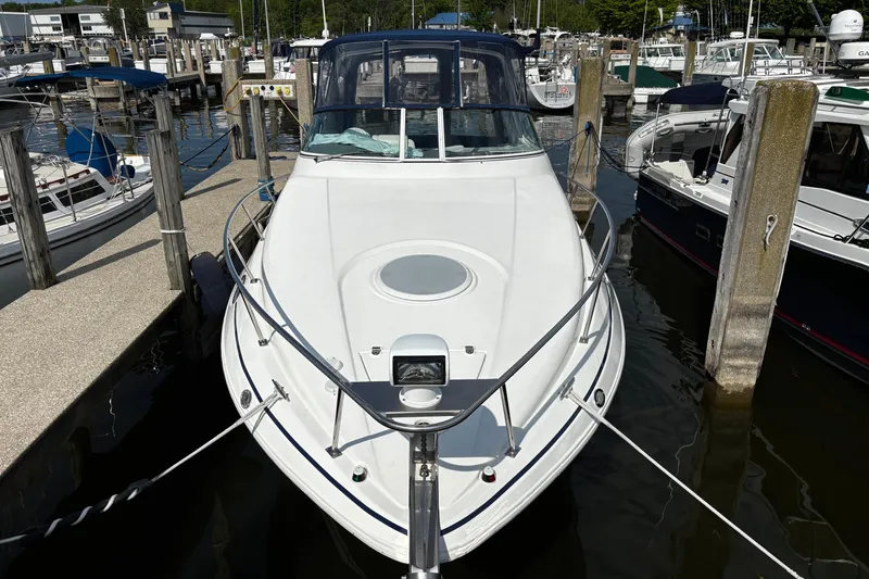 Slide: The Image of 2005 Cruisers Yachts 280 CXi Express docked at marina. - 16