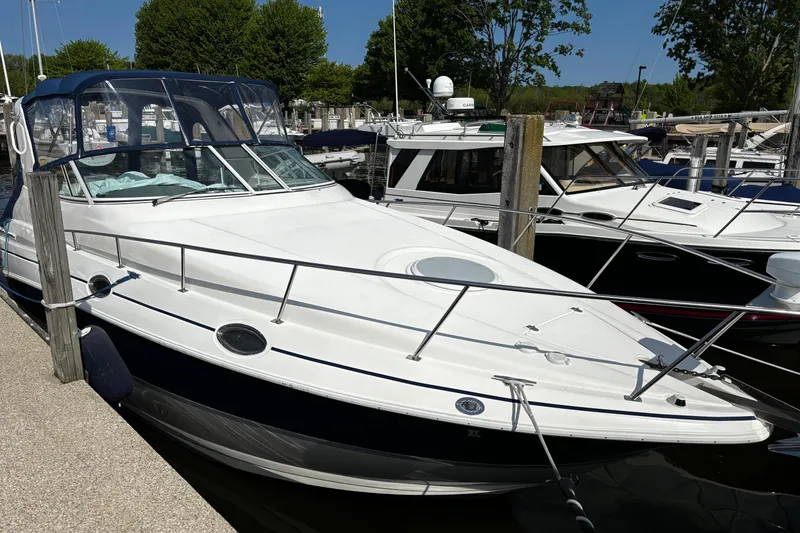 Slide: The Image of 2005 Cruisers Yachts 280 CXi Express docked at marina. - 17