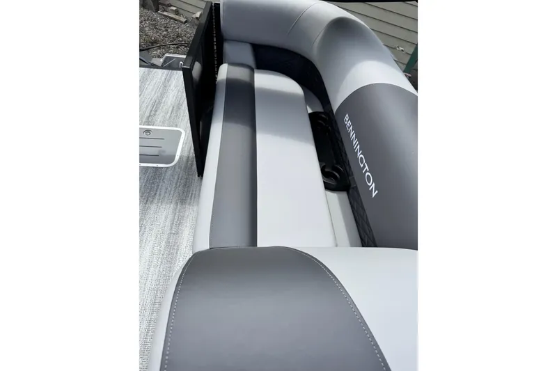 Slide: The Image of 2026 Bennington S 23 SSR boat interior with sleek gray seating design. - 17