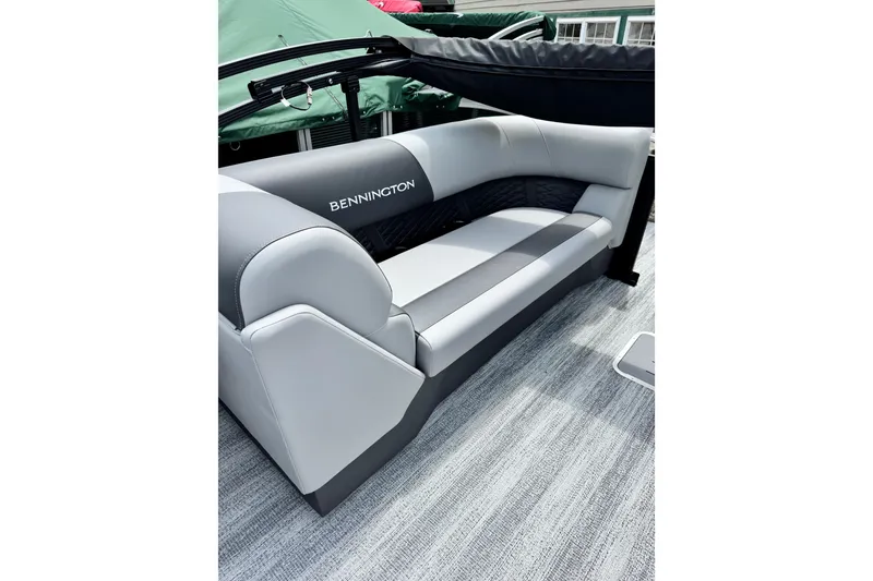 Slide: The Image of 2026 Bennington S 23 SSR boat interior with sleek gray seating. - 18