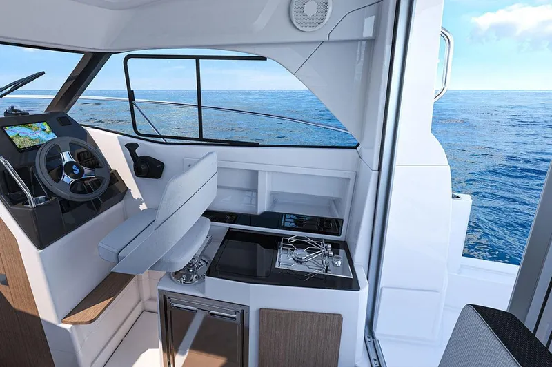 Slide: The Image of Interior of 2026 Beneteau Antares 7 with helm and ocean view. - 16