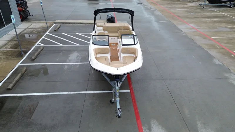 Slide: The Image of 2026 Bayliner VR6OB boat in parking lot, aerial view. - 14