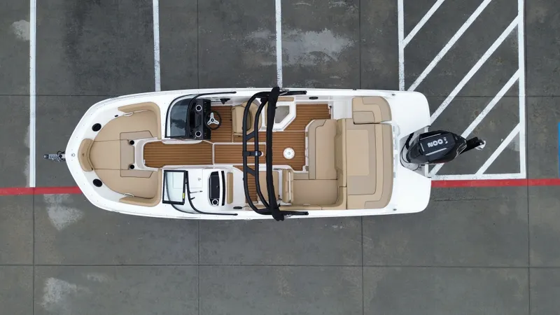 Slide: The Image of Aerial view of 2026 Bayliner VR6OB boat on parking lot. - 20