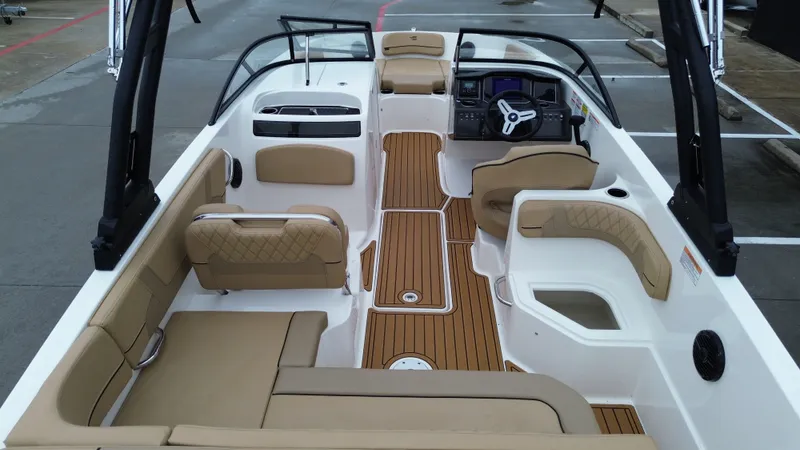 Slide: The Image of Interior of 2026 Bayliner VR6OB featuring sleek seating and modern design. - 26