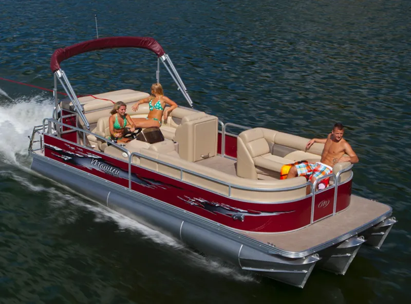 The Image of Manufacturer Provided Image: 2014 Manitou 22 Aurora pontoon boat cruising on a lake with passengers. - 8