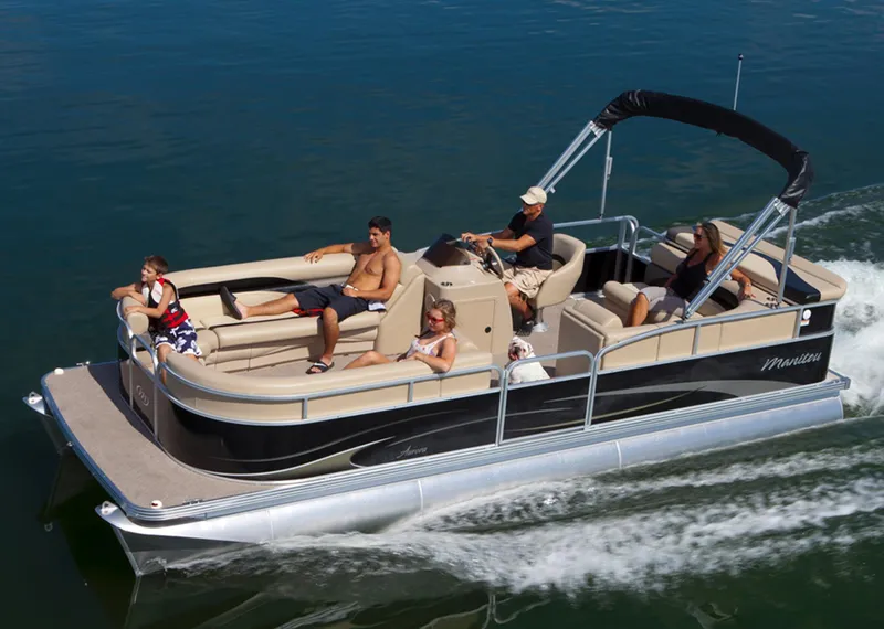 Slide: The Image of Manufacturer Provided Image: 2014 Manitou 22 Aurora pontoon boat cruising with passengers on a lake. - 9