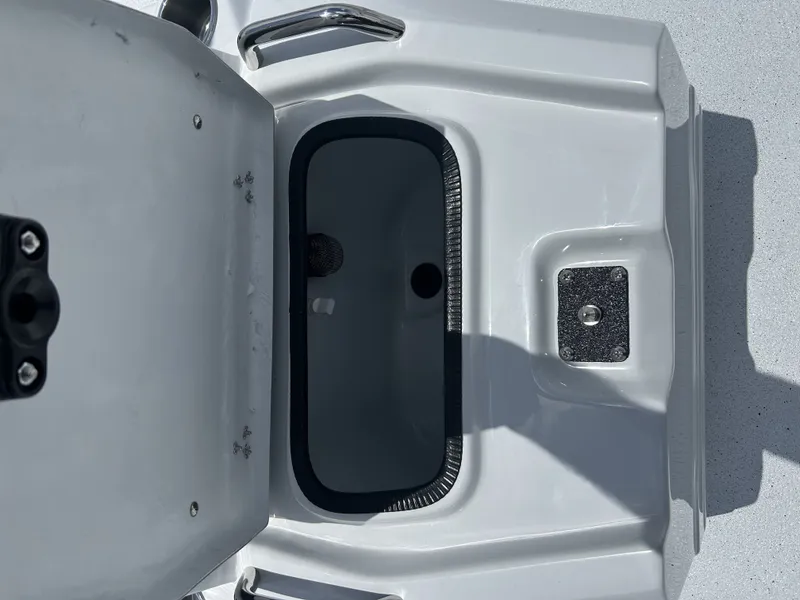 Slide: The Image of Xpress SW22B 2026 boat hatch with storage compartment. - 13