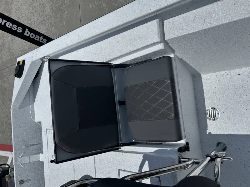 Slide: The Image of Xpress SW22B 2026 boat seat with gray upholstery. - 16