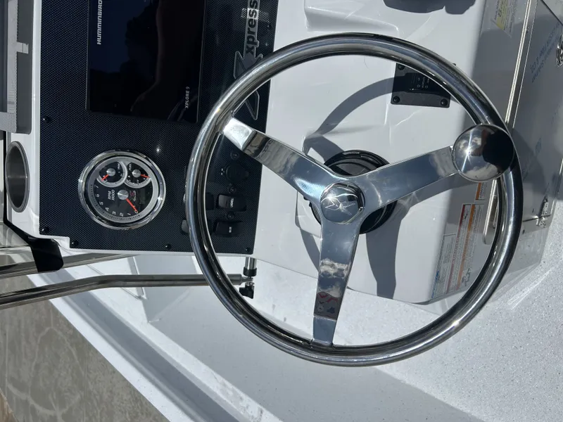 Slide: The Image of Steering console of Xpress SW22B boat, model year 2026. - 21