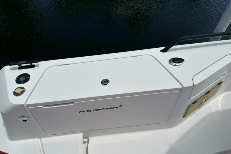 Slide: The Image of 2021 Axopar Brabus 37 XC Cross Cabin boat deck detail with sleek design elements. - 10