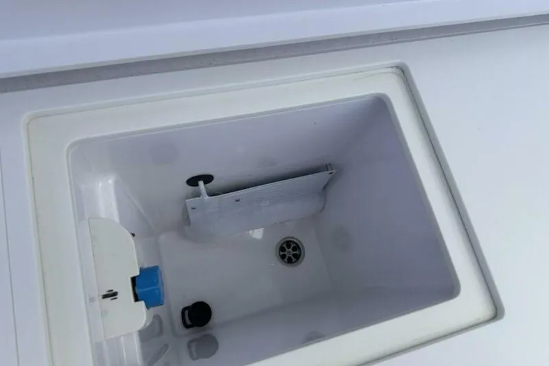 Slide: The Image of Storage compartment in 2021 Axopar Brabus 37 XC Cross Cabin boat. - 12