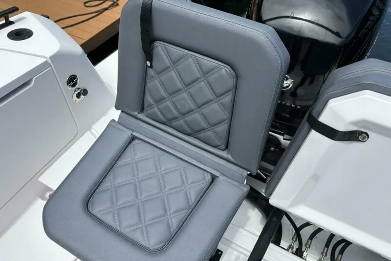 Slide: The Image of Luxurious seating on 2021 Axopar Brabus 37 XC Cross Cabin with quilted design. - 9