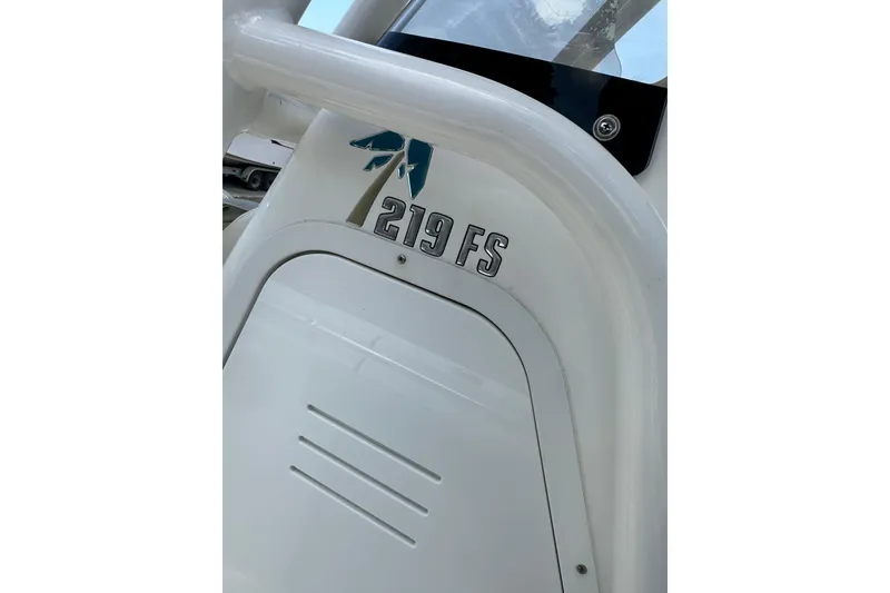 Slide: The Image of 2025 Key West 219 FS boat detail, showcasing sleek design and model emblem. - 30