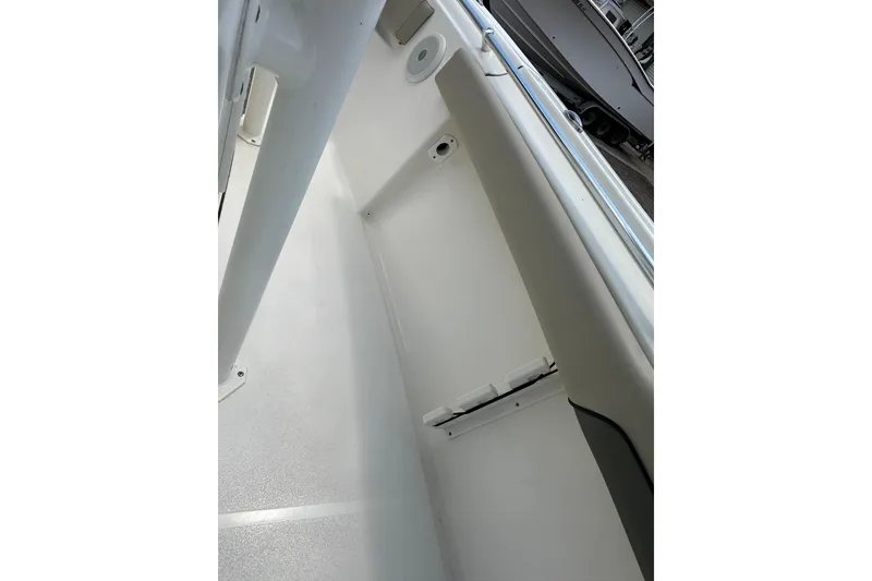Slide: The Image of Interior view of 2025 Key West 219 FS boat, showcasing sleek design and storage space. - 34