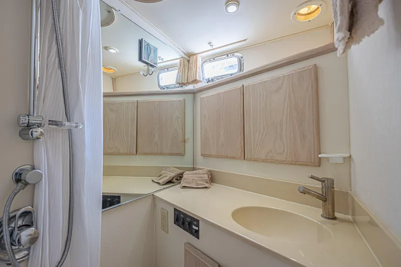 Slide: The Image of Bathroom interior of 1994 Tollycraft 45 Cockpit Motor Yacht with shower and sink. - 36