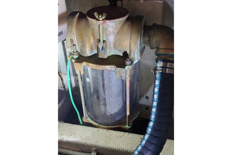 Slide: The Image of Marine engine filter system on a 1993 Tollycraft 45 Cockpit Motor Yacht. - 45