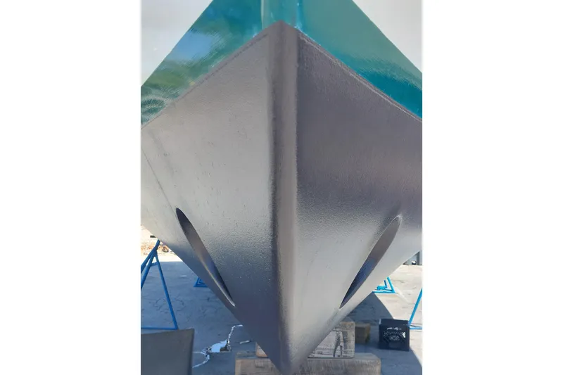 Slide: The Image of Bow view of 1993 Tollycraft 45 Cockpit Motor Yacht on dry dock. - 51