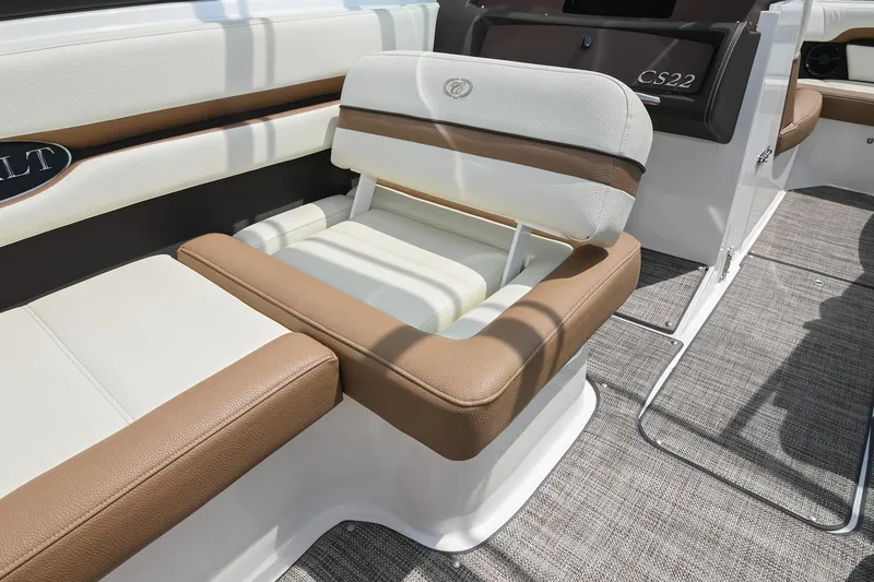 Slide: The Image of 2022 Cobalt CS22 boat interior with beige and white seating, showcasing luxury design. - 26