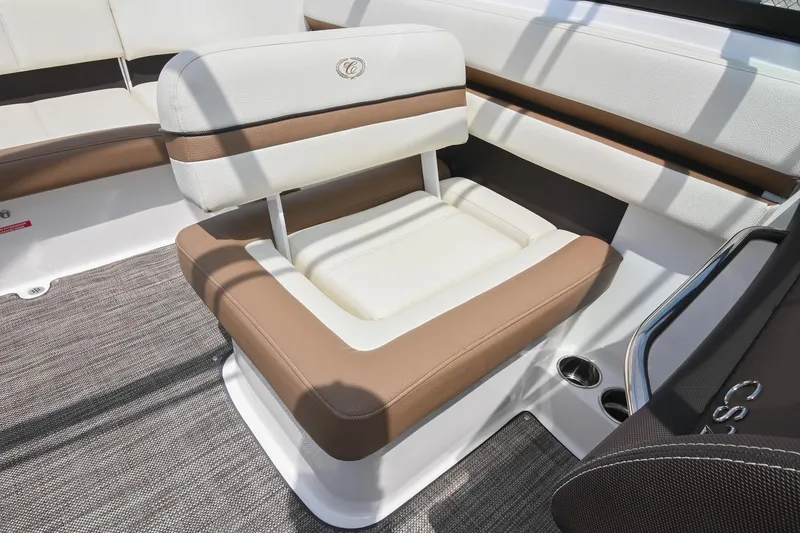 Slide: The Image of 2022 Cobalt CS22 boat seat with brown and white upholstery, featuring a stylish design. - 31