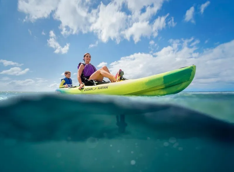 The Image of 2023 Ocean Kayak Malibu PDL on the water with two people kayaking. - 0