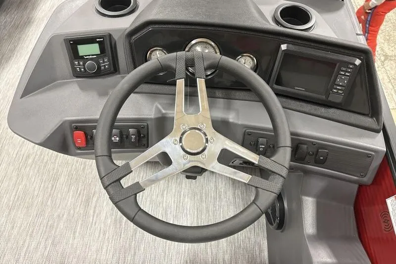 Slide: The Image of Steering console of 2026 Bennington S 20 SSR boat with modern controls and gauges. - 12