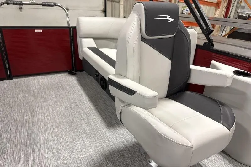 Slide: The Image of 2026 Bennington S 20 SSR boat interior with plush seating and modern design. - 15