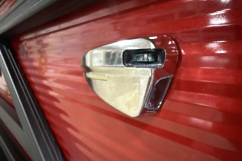 Slide: The Image of Close-up of a 2026 Bennington S 20 SSR boat handle on a red surface. - 17