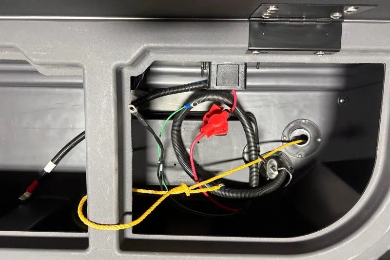 Slide: The Image of 2026 Bennington S 20 SSR boat wiring compartment with cables and connectors. - 31