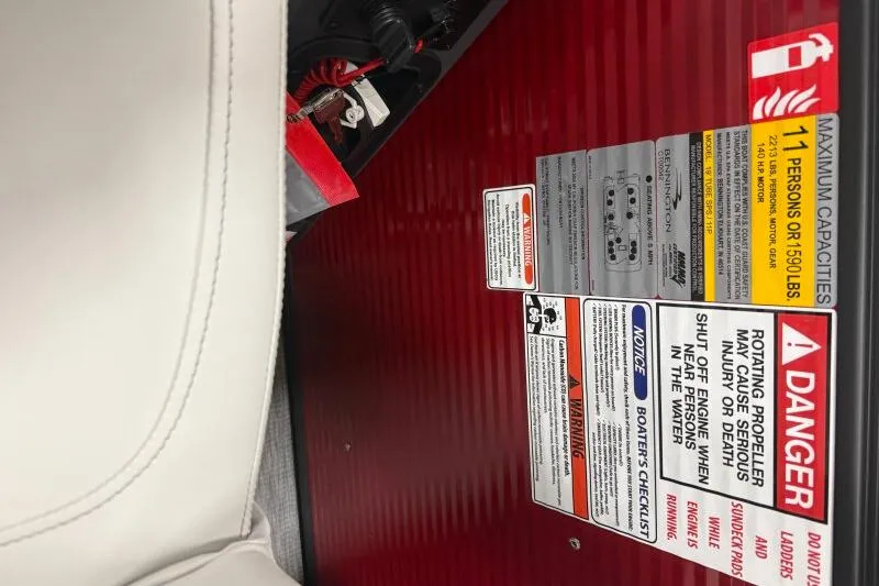 Slide: The Image of Safety and capacity labels on 2026 Bennington S 20 SSR boat interior. - 32
