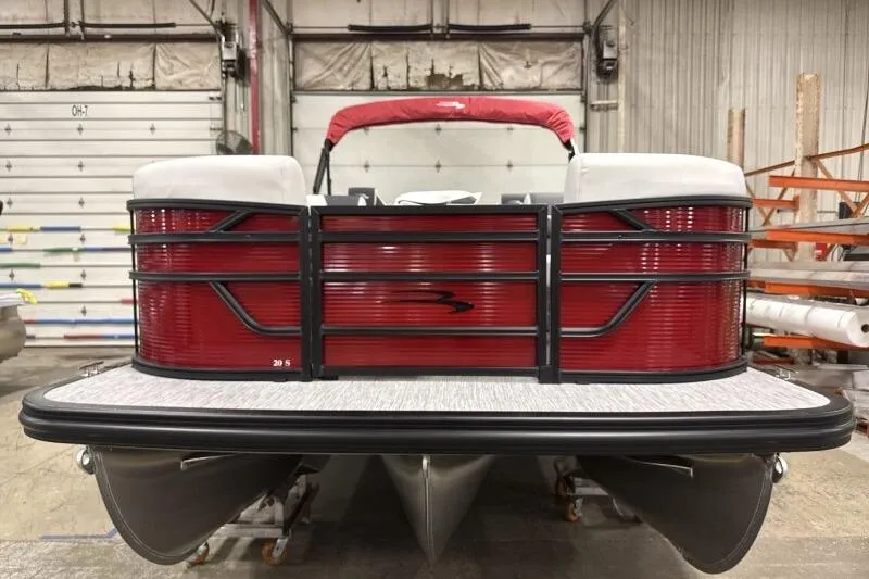 Slide: The Image of 2026 Bennington S 20 SSR pontoon boat in a warehouse setting. - 5