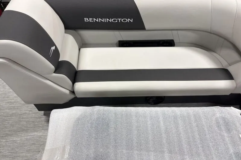 Slide: The Image of 2026 Bennington S 20 SSR boat seat with gray and white upholstery. - 7