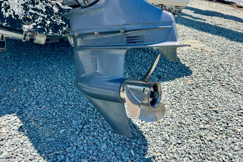 Slide: The Image of Outboard motor of 2010 Key West 186 Sportsman on gravel surface. - 23