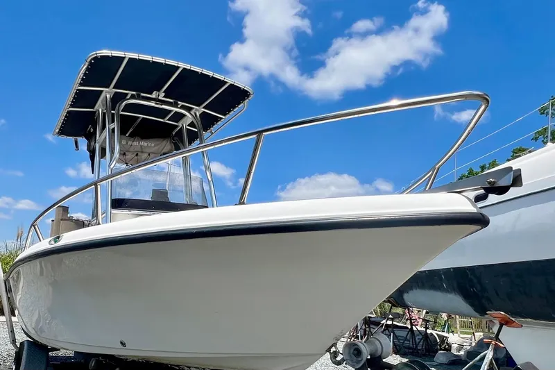 Slide: The Image of 2010 Key West 186 Sportsman boat under clear blue sky. - 5