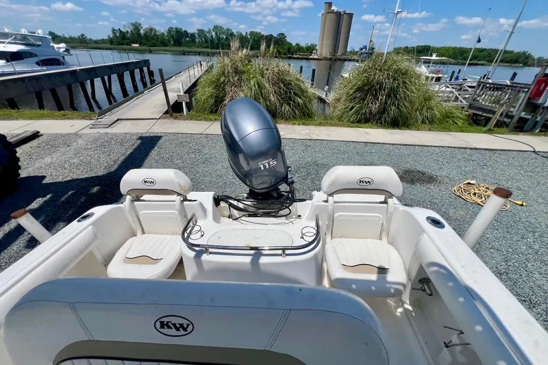 Slide: The Image of 2010 Key West 186 Sportsman boat docked near a marina with Yamaha 115 engine. - 7