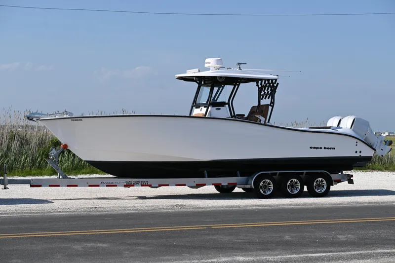 The Image of 2021 Cape Horn 32 T boat on trailer, side view, outdoors. - 0