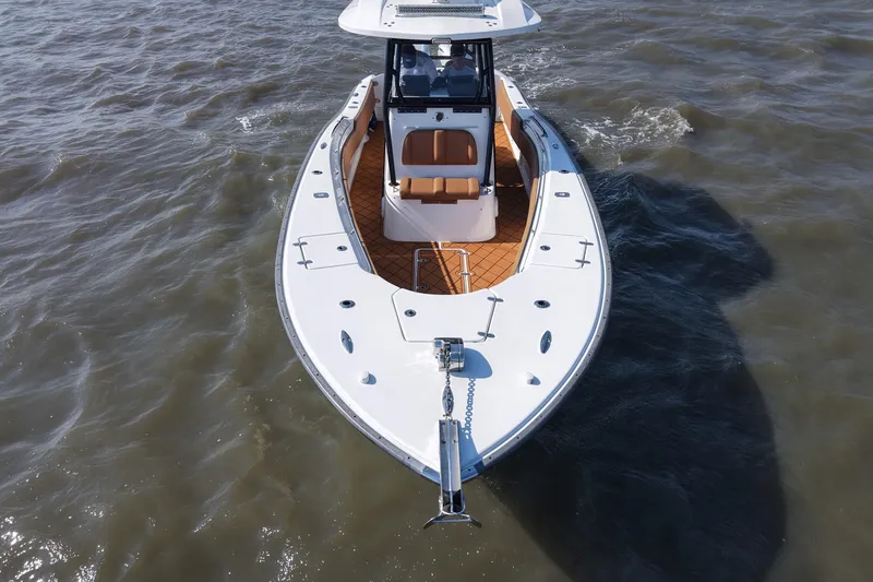 Slide: The Image of 2021 Cape Horn 32 T boat cruising on open water, aerial view. - 12