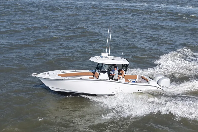 Slide: The Image of 2021 Cape Horn 32 T boat cruising on open water. - 18