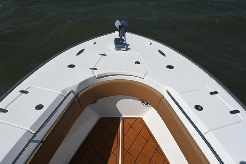 Slide: The Image of Bow view of 2021 Cape Horn 32 T boat with sleek design and spacious deck. - 19