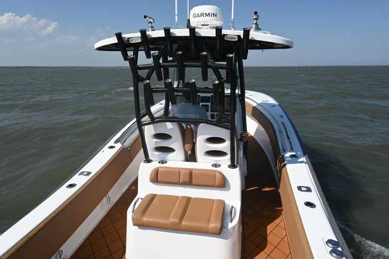 Slide: The Image of 2021 Cape Horn 32 T boat on open water, featuring a sleek design and modern equipment. - 32