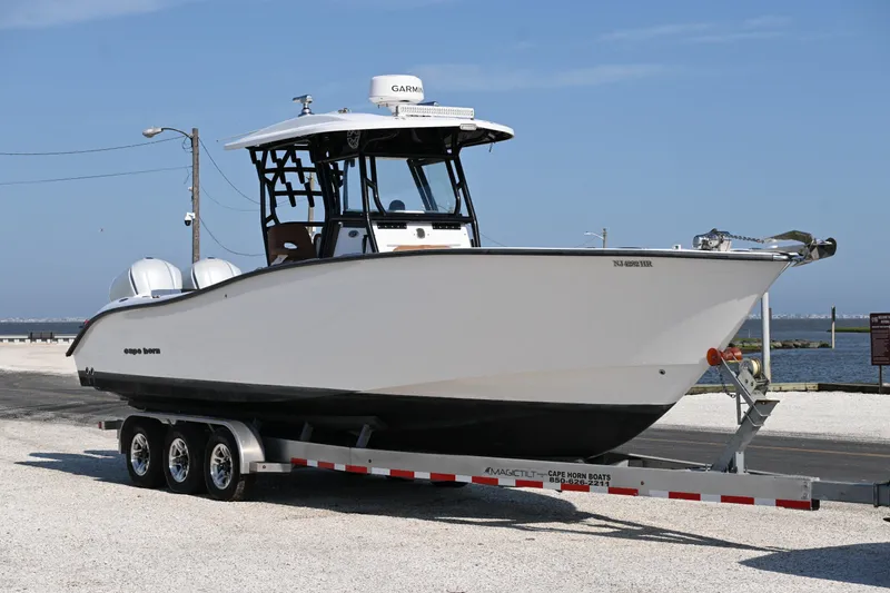 Slide: The Image of 2021 Cape Horn 32 T boat on trailer by the waterfront. - 4