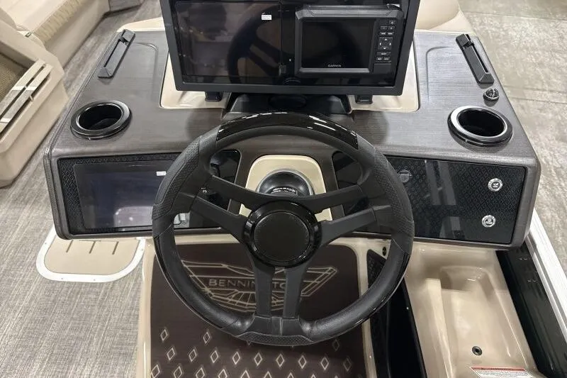 Slide: The Image of Steering console of 2026 Bennington 24 M L-Bench boat with modern controls and displays. - 20